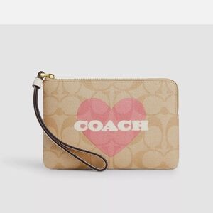 Coach Corner Zipper Tan and Pink Heart Wristlet